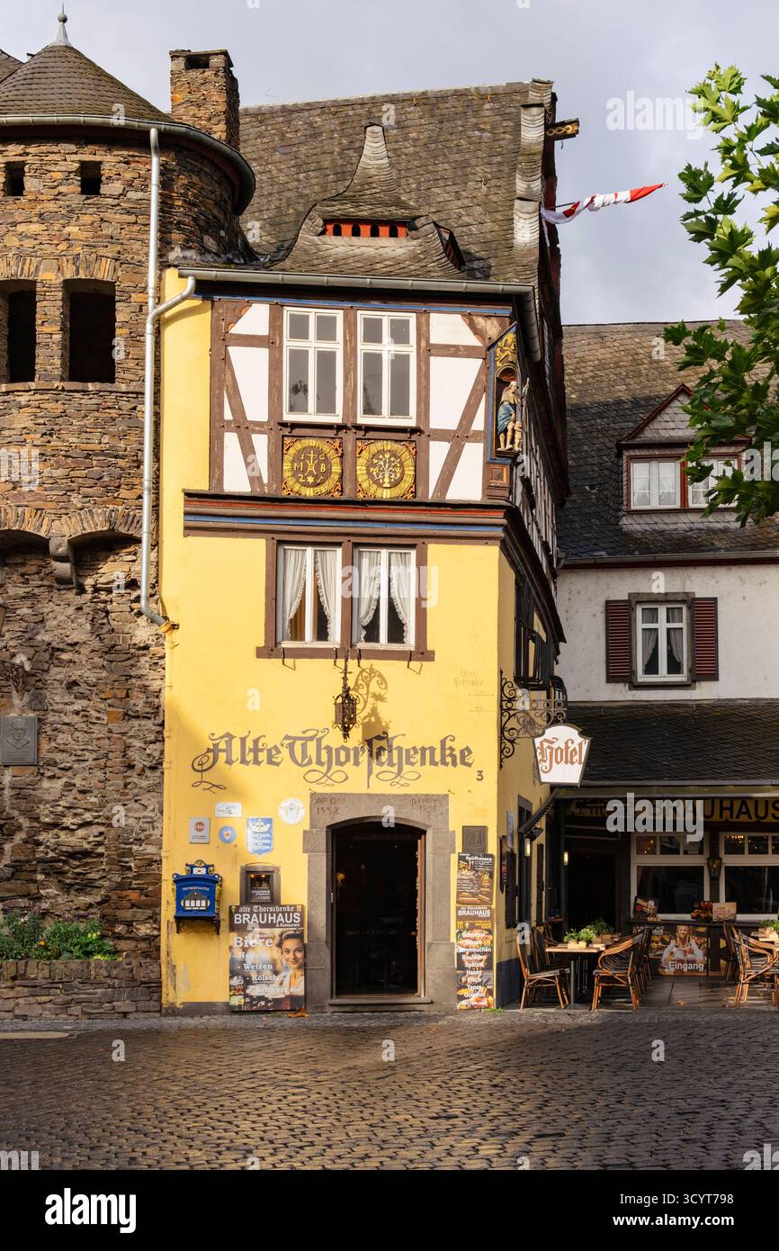 Historic hotel timbered building on a cobbled street in old town of Cochem, Rhineland-Palatinate, Germany, Europe.  Originally built in 1332 Stock Photo