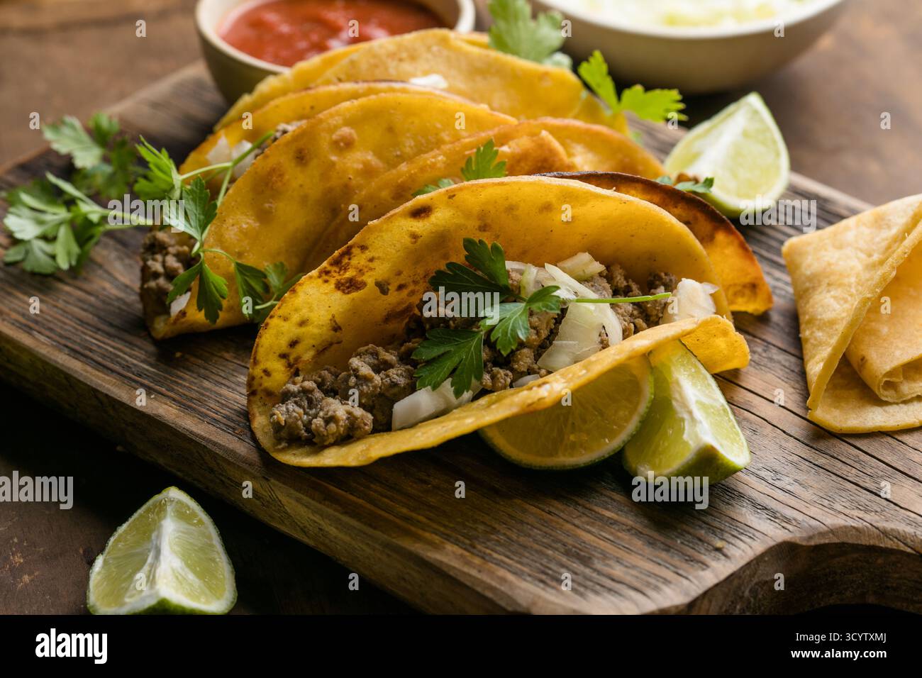 Traditional Mexican birria tacos with beef, cheese, and rich consommé ...