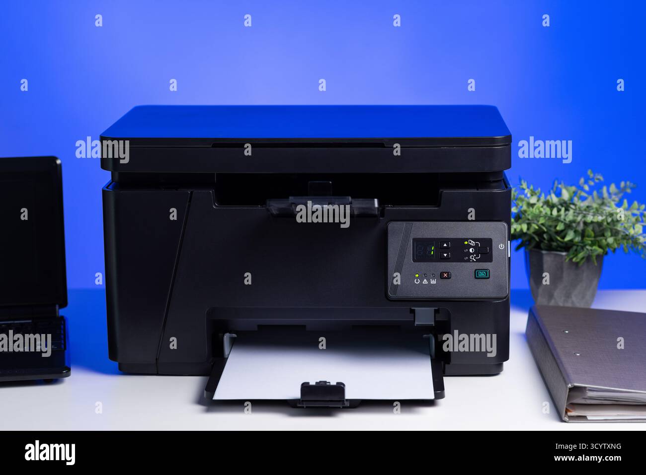 The multi-function laser printer in the home office. Stock Photo