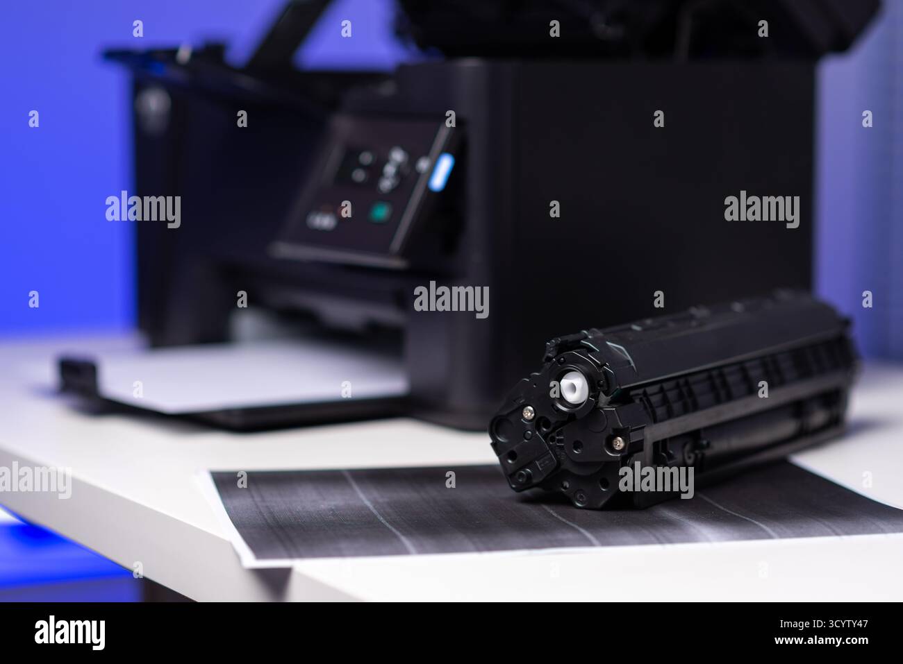 Black cartridge for laser printer. Laser printer issues concept. Stock Photo