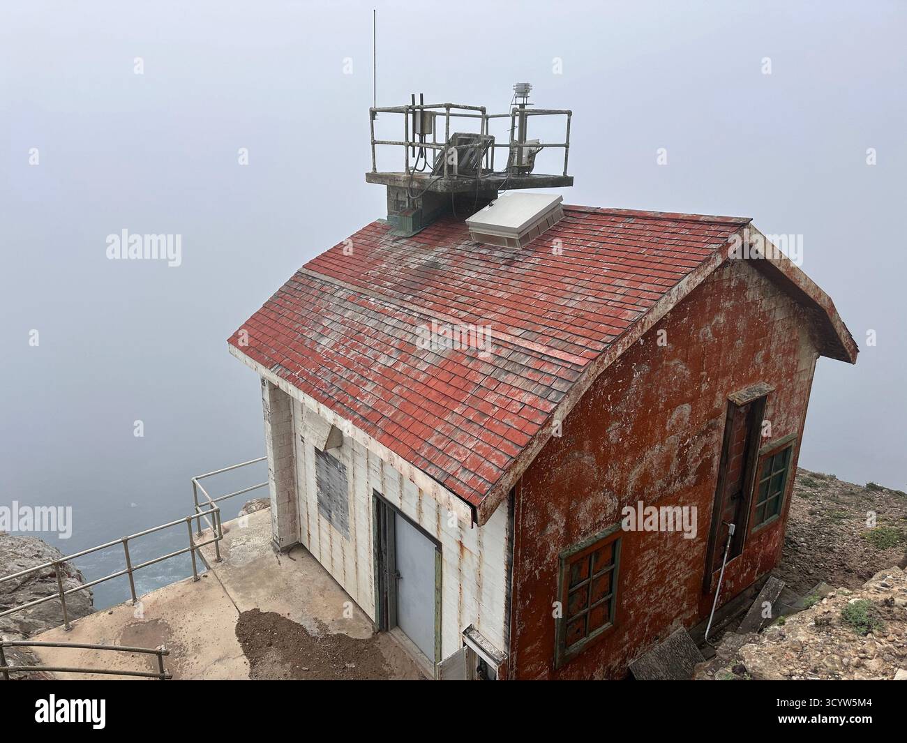 Weathered Lighthouse Building in Fog – Point Reyes, California - Smartphone Captured Stock Image
