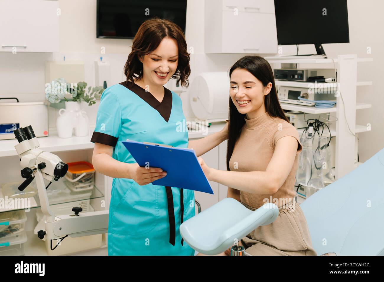 Gynecologist is using colposcopy tools during a gynecological exam ...