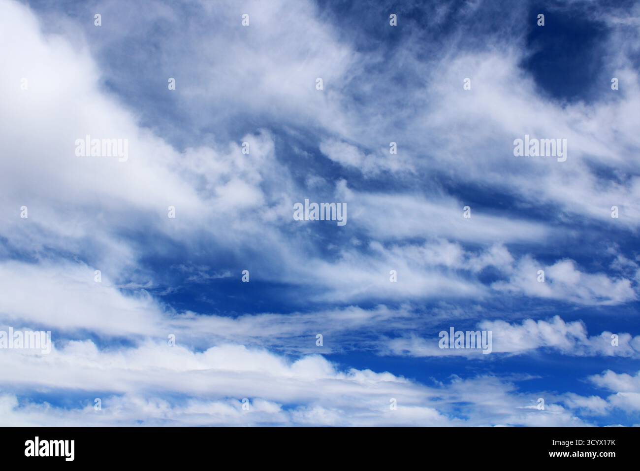 Between the clouds, beautiful blue sky with white clouds Stock Photo