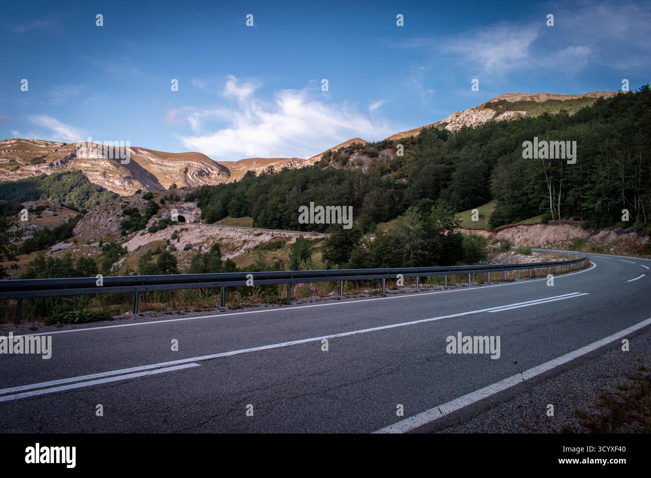 A road passing through mountains in Montenegro. Stock Photo