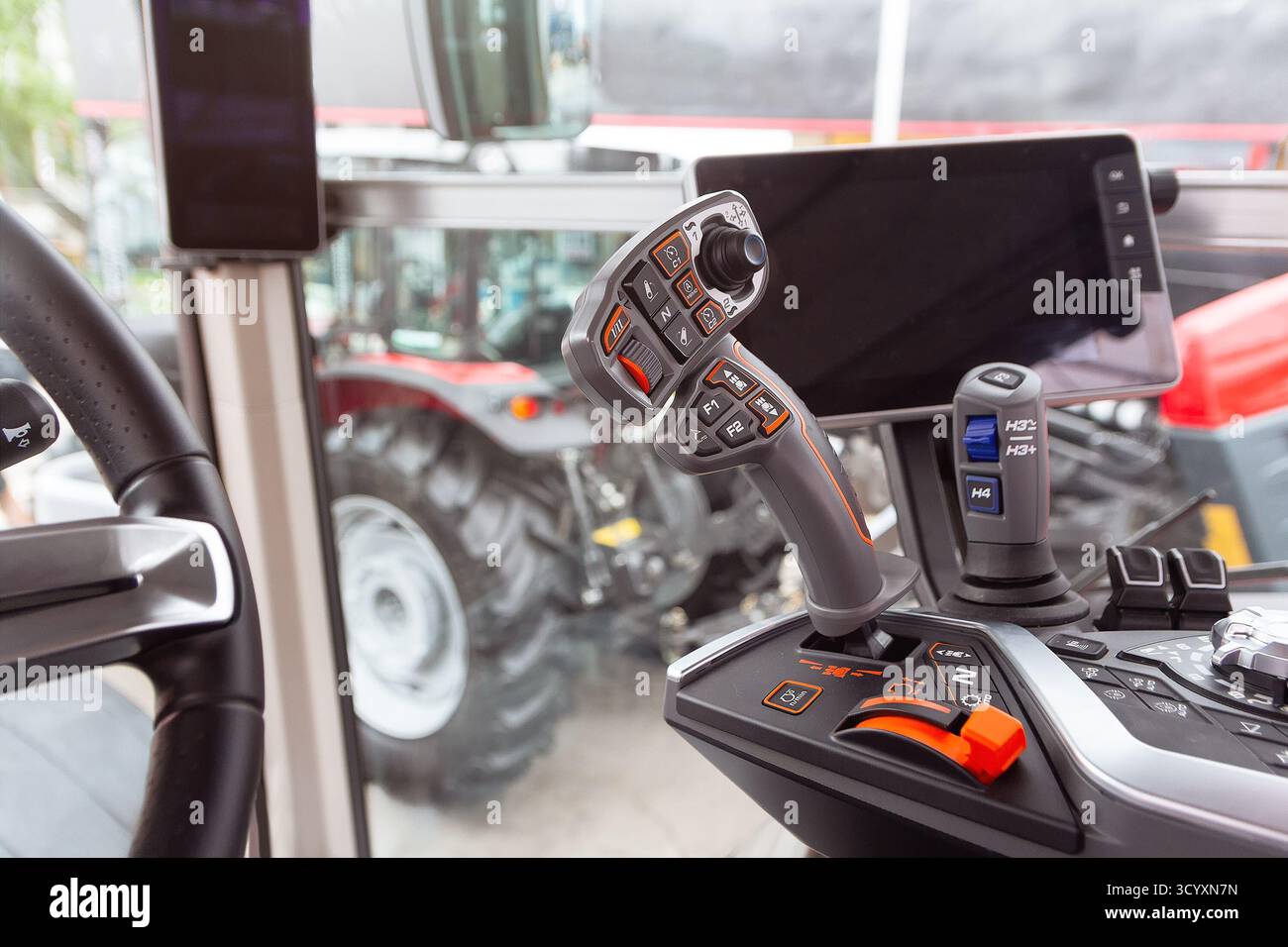Tracktor Stick The cabin and control stick tractor of a modern tractor close-up ...