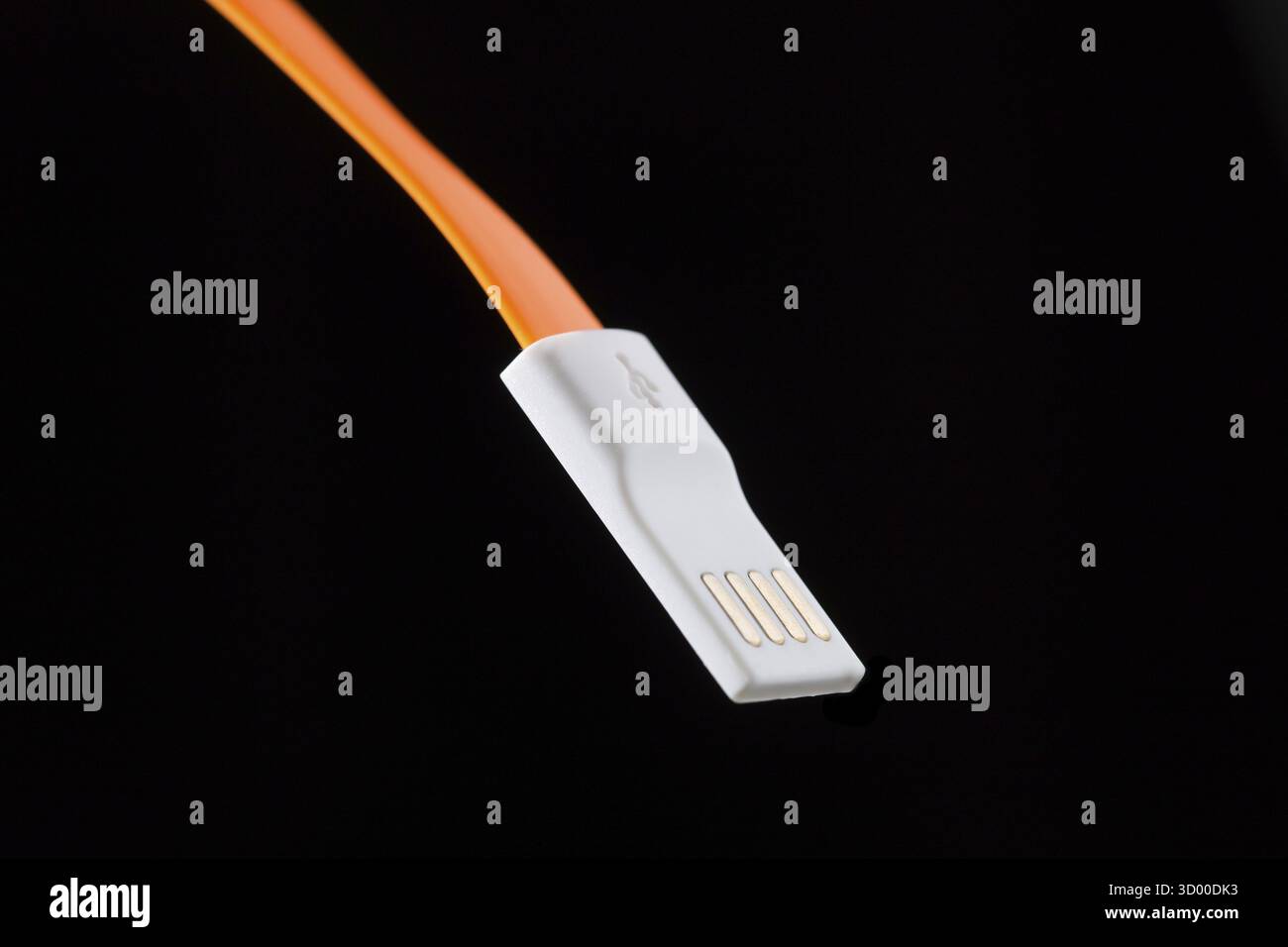 Orange connector on isolated black empty background Stock Photo