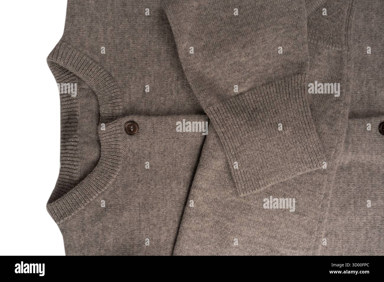 Grey cardigan texture as a background. Knitted pattern. Top view. Stock Photo