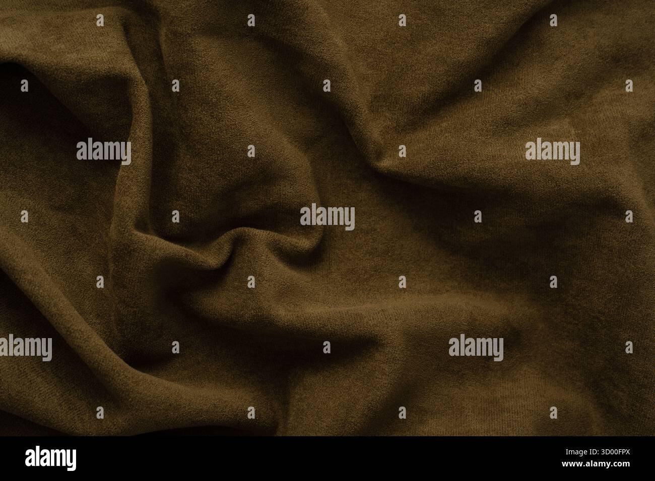 Green fabric texture as a background. Top view. Stock Photo