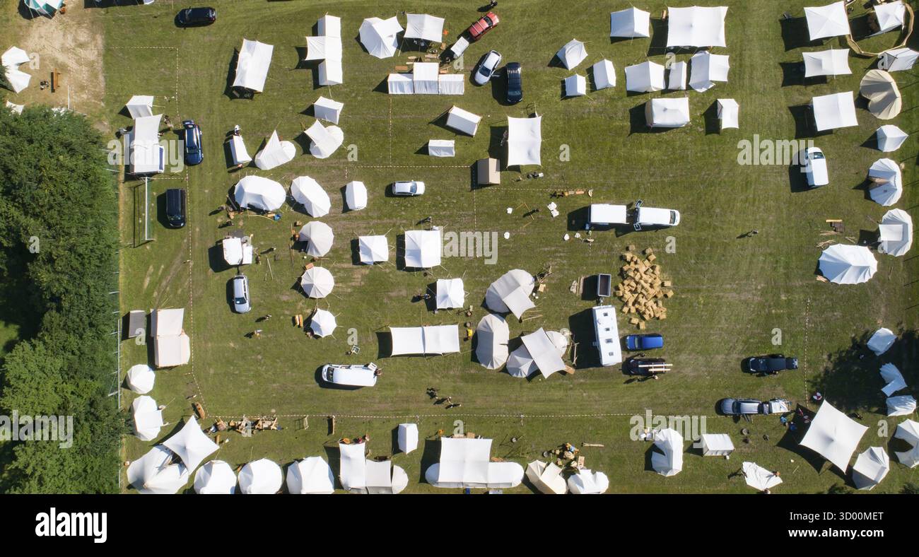 Aerial view with drone of a tent camp and market stalls at a medieval ...
