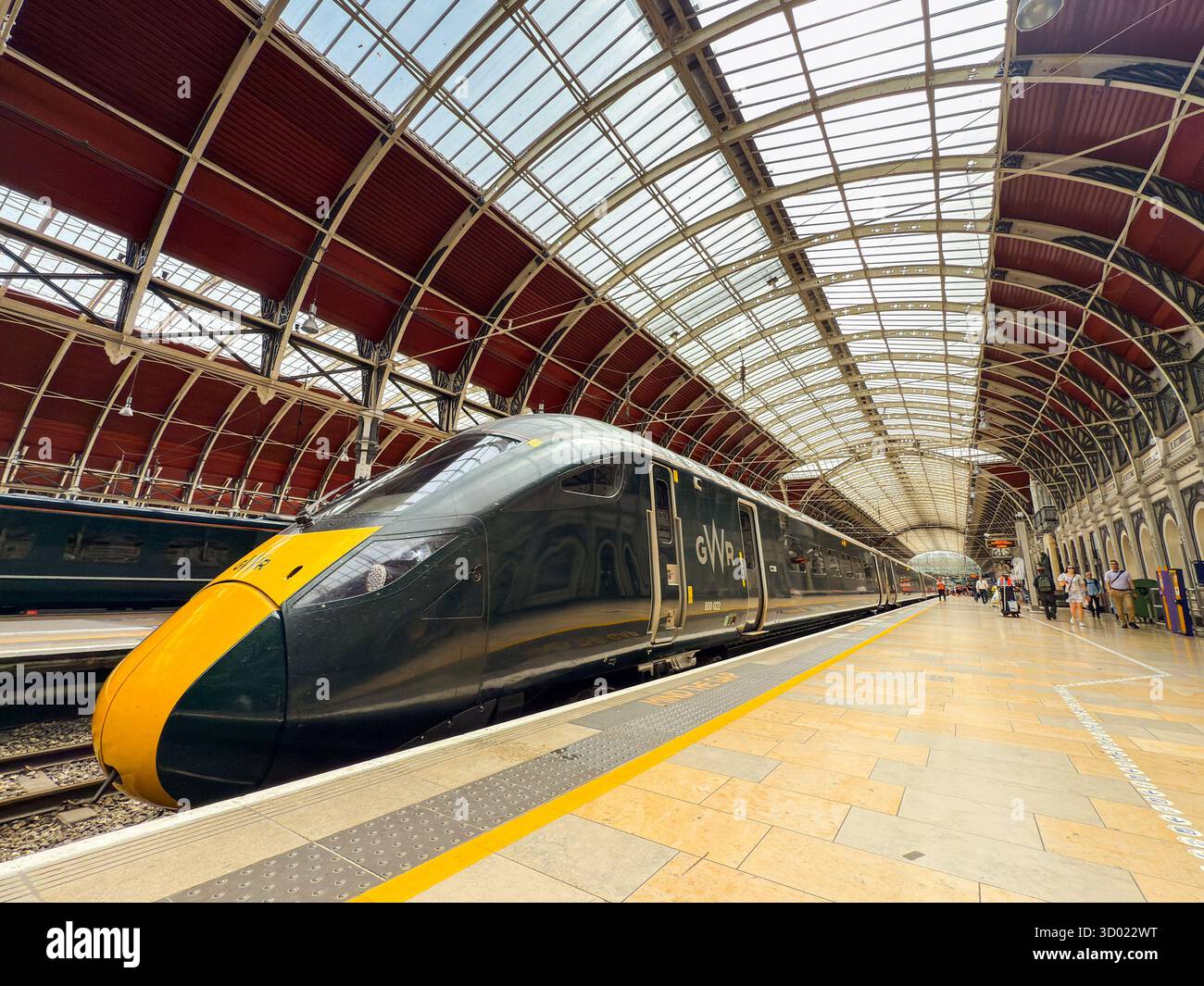 London, England, UK - 4 July 2025: Wide angle view of a Class 800 high speed train alongside Platform 1 at London Paddington railway station. - Smartphone Captured Stock Image