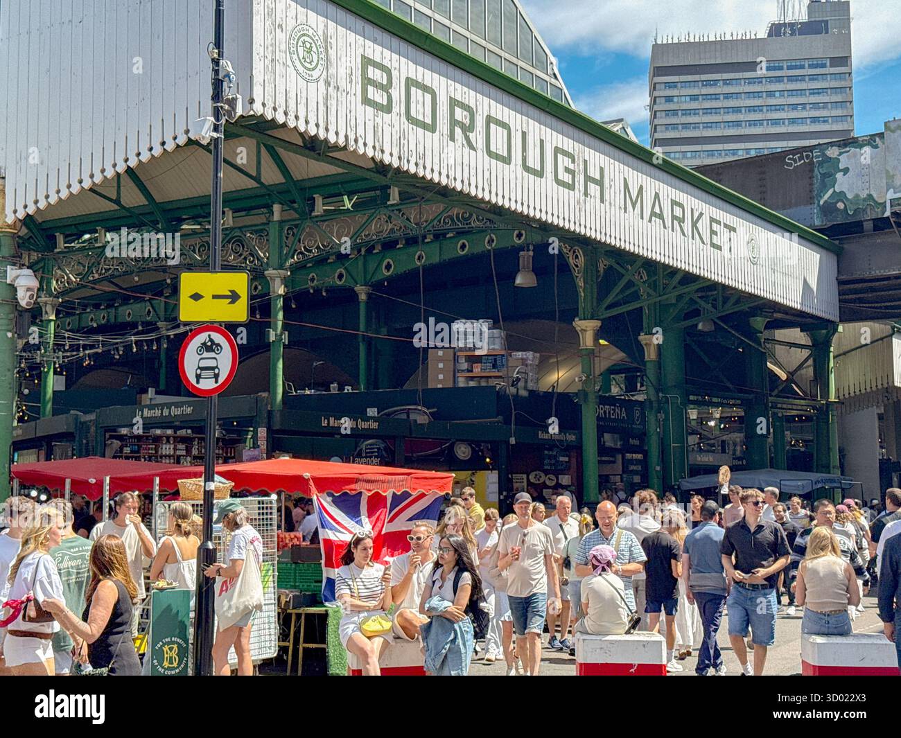 London, England, UK - 4 July 2025: Crowds of people visiting Borough Market in central London. - Smartphone Captured Stock Image