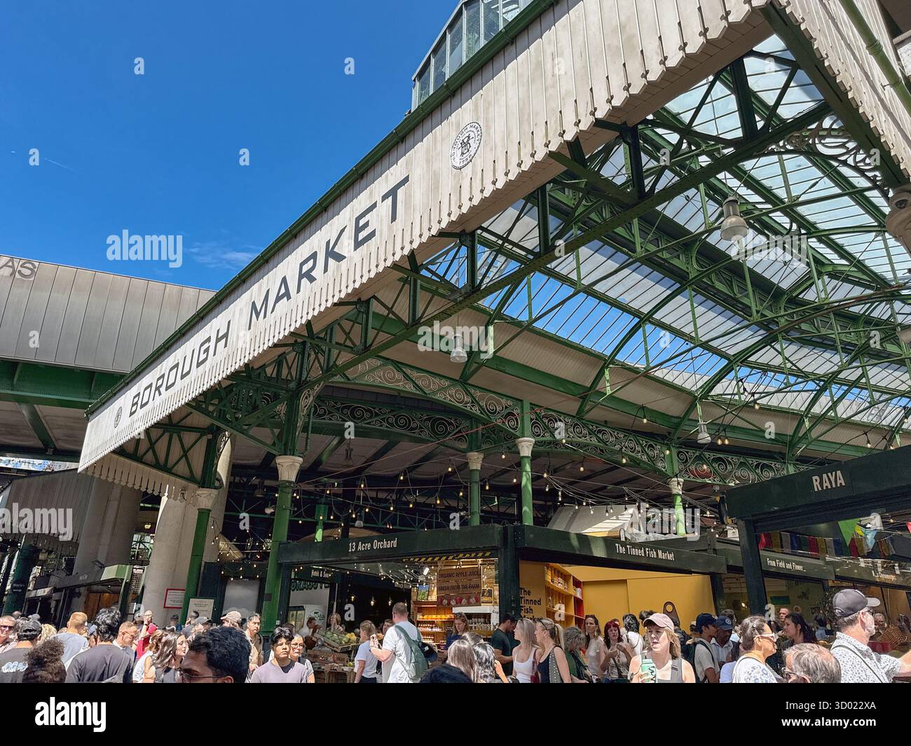 London, England, UK - 4 July 2025: Crowds of people visiting Borough Market in central London. - Smartphone Captured Stock Image