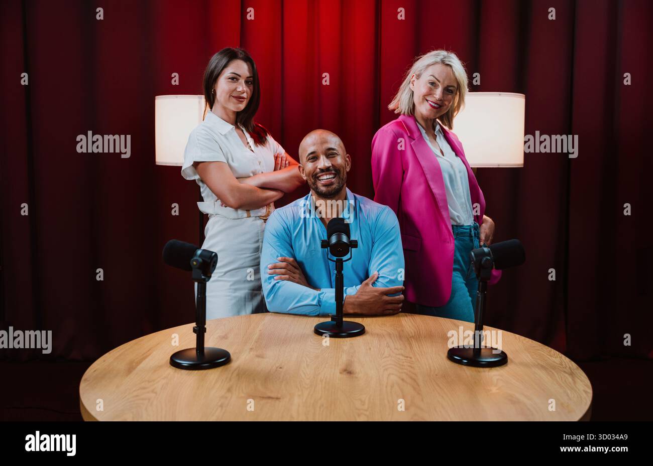 Group of diverse podcasters recording engaging audio content with ...
