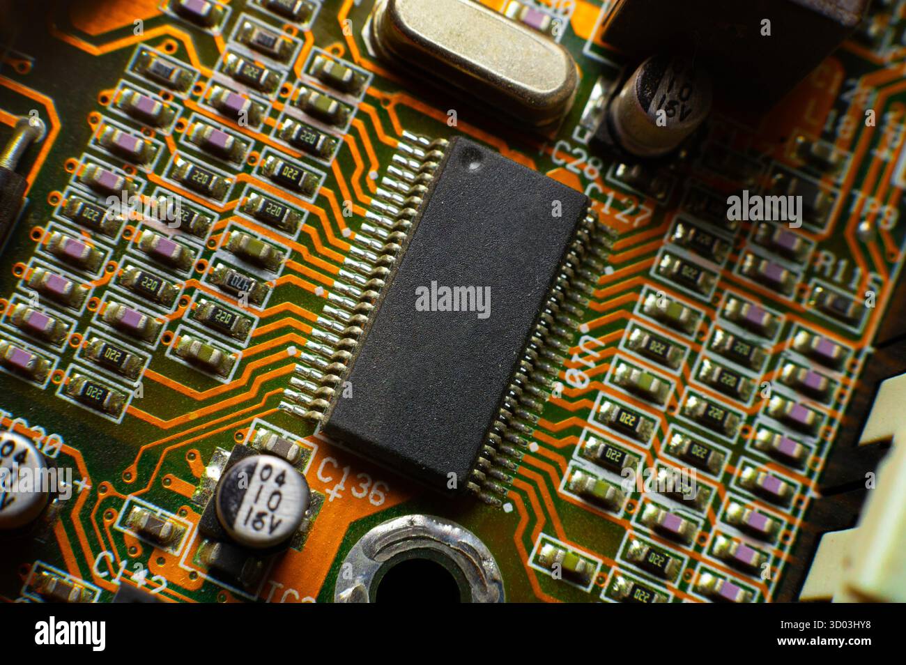 Elements of microcircuits on a green and red board. Microprocessor on ...