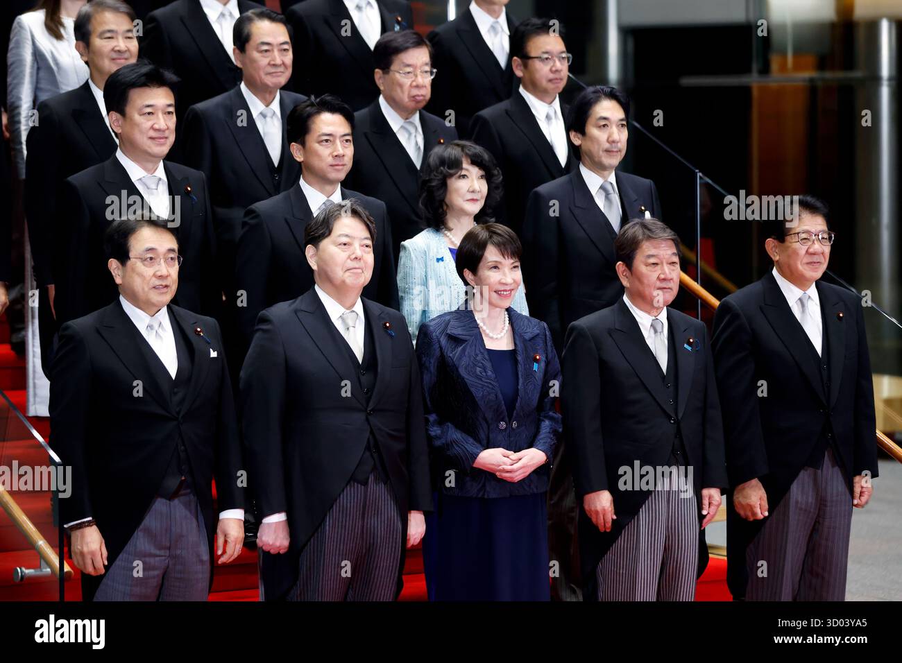 Japan's Prime Minister Sanae Takaichi, front row center, poses with her ...
