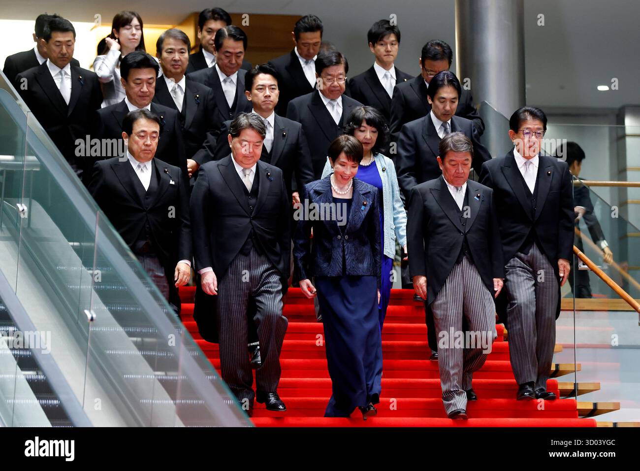 Japan's Prime Minister Sanae Takaichi, front row center, poses with her ...