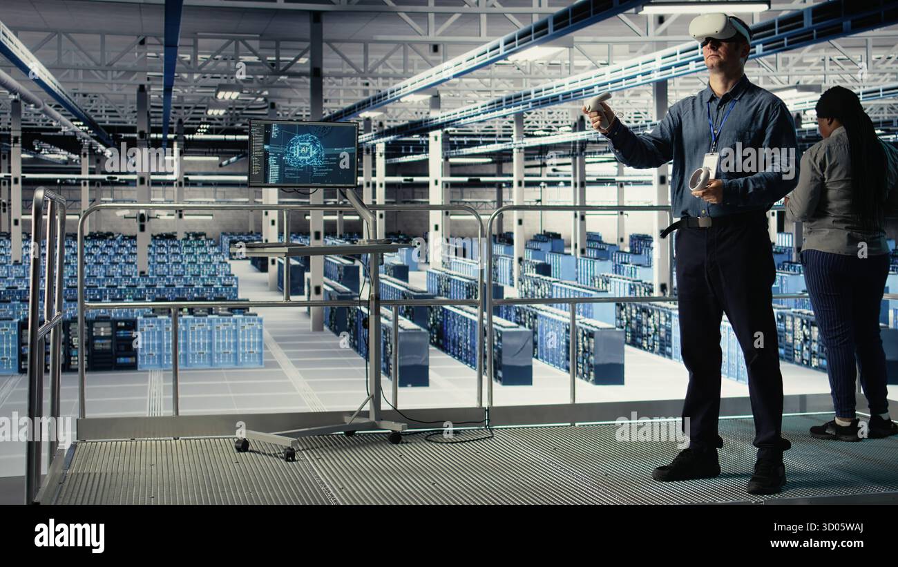 Programmer in server room wearing VR headset optimizing deep learning systems handling tasks. Data center IT specialist adjusting AI model parameters using virtual reality, camera A Stock Photo