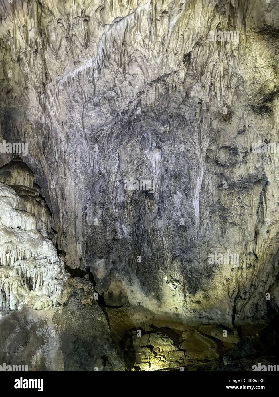 Impressive limestone formations and textures inside the Ice Cave (Ledena Pećina) in Uvac Canyon, Serbia, showcasing natural beauty and geological patt - Smartphone Captured Stock Image