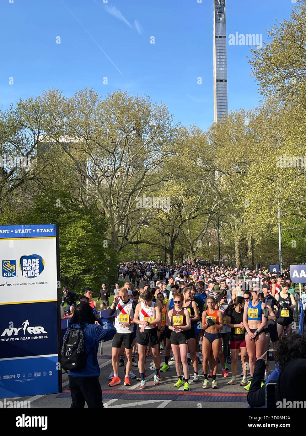 Runners in Central Park, NYC, full of energy and city spirit. - Smartphone Captured Stock Image