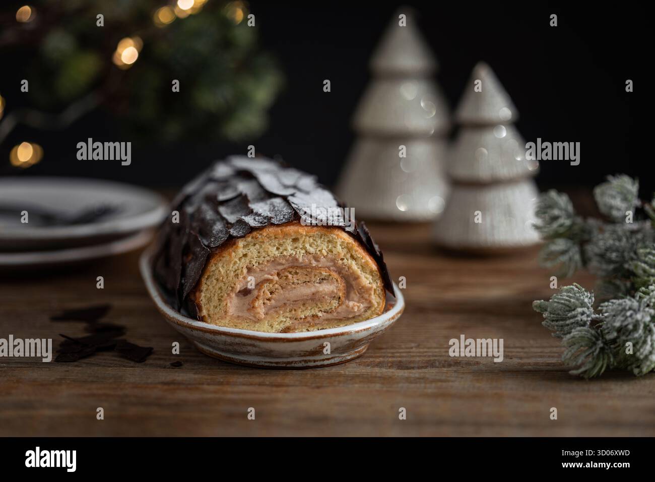 Rolled chestnut log Stock Photo - Alamy
