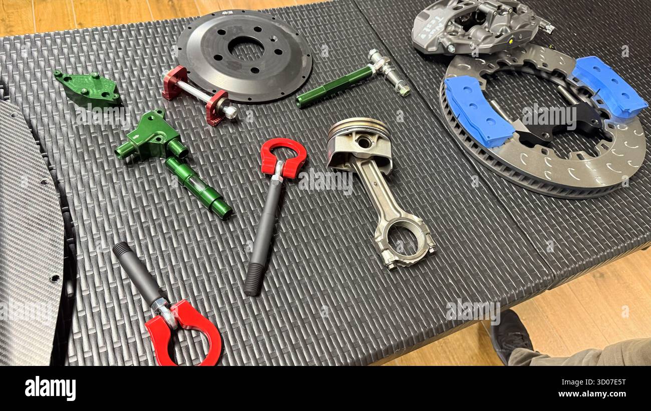 Car Parts On Workshop Table, Mechanical Tools, Piston And Brake Components, Engineering Garage Setup, Auto Repair Equipment, Motor Maintenance Concept - Smartphone Captured Stock Image