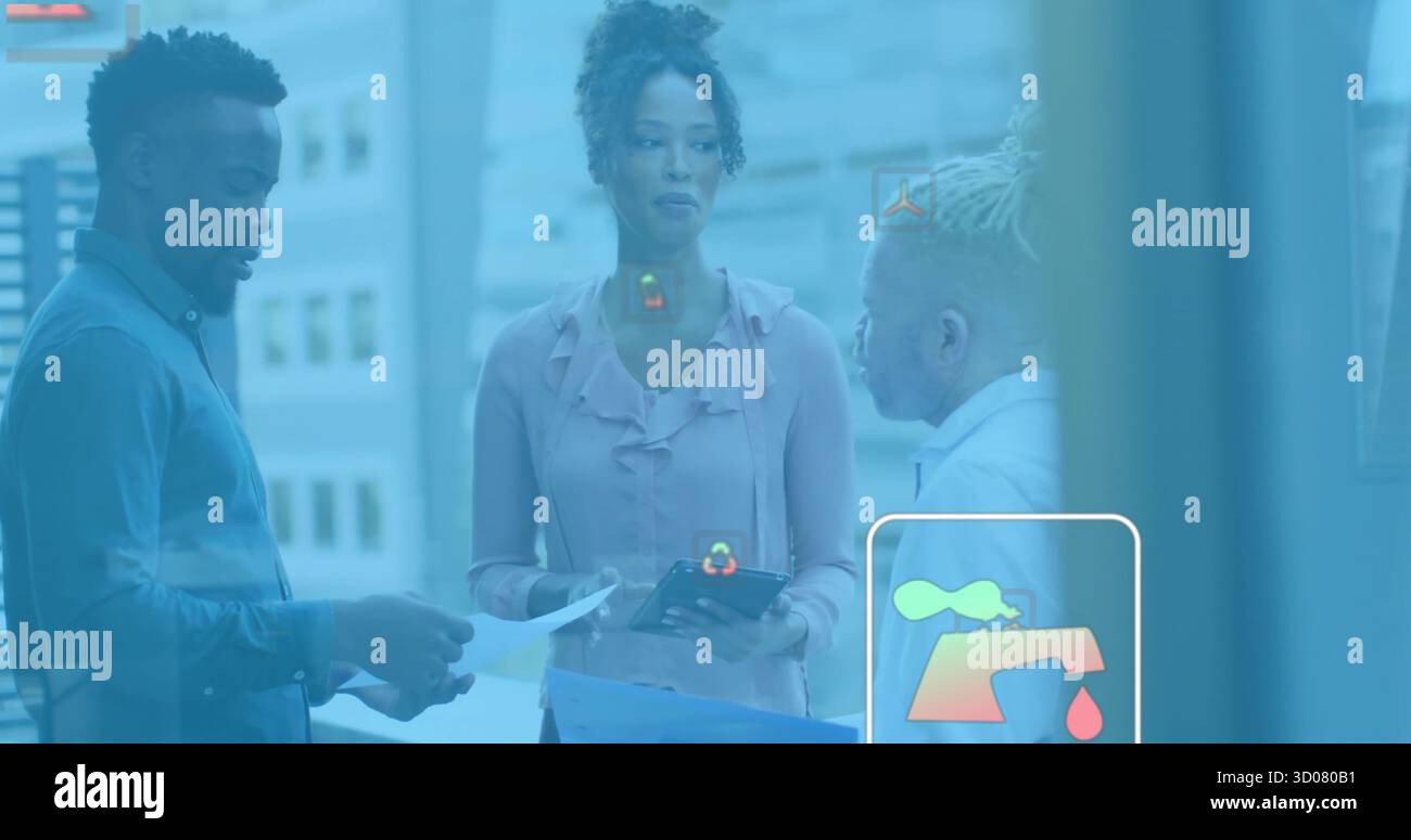 Professionals discussing document and tablet in office near window, with blue binder, data icons Stock Photo