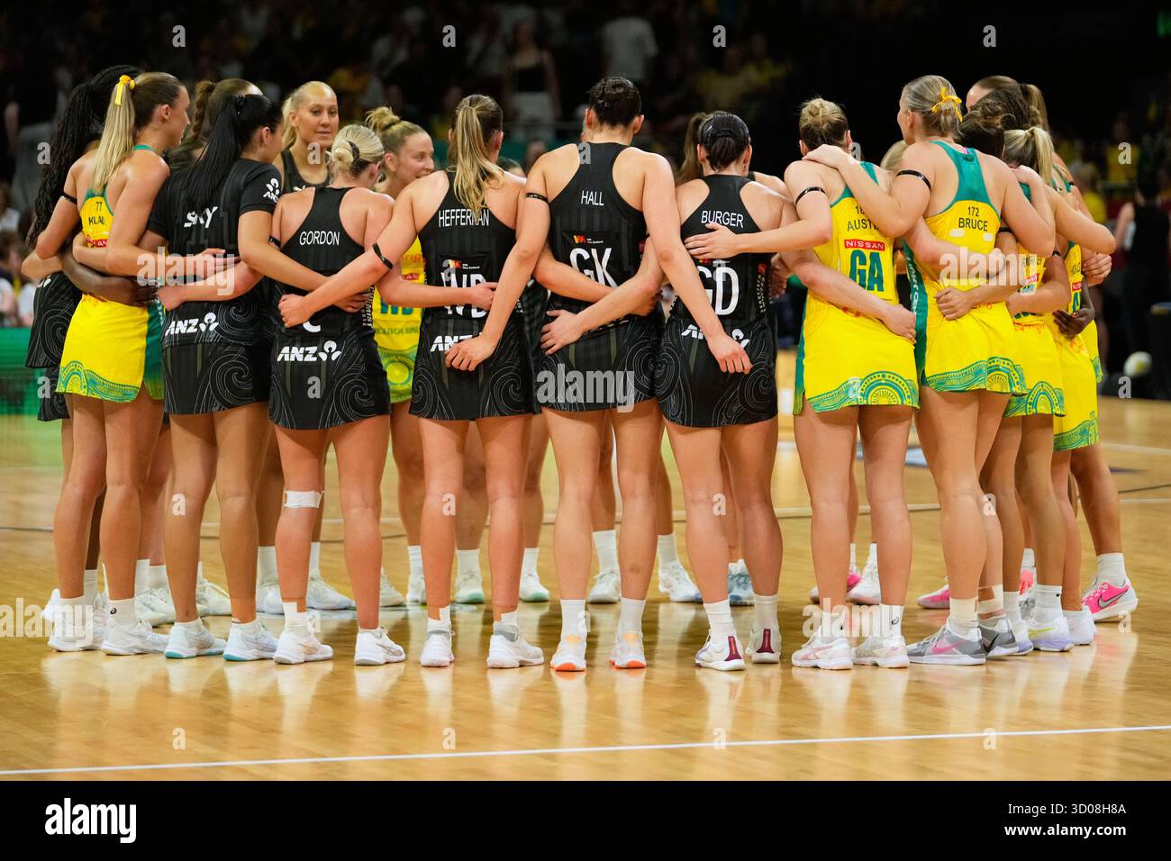 Players embrace following the netball test match for the Constellation ...