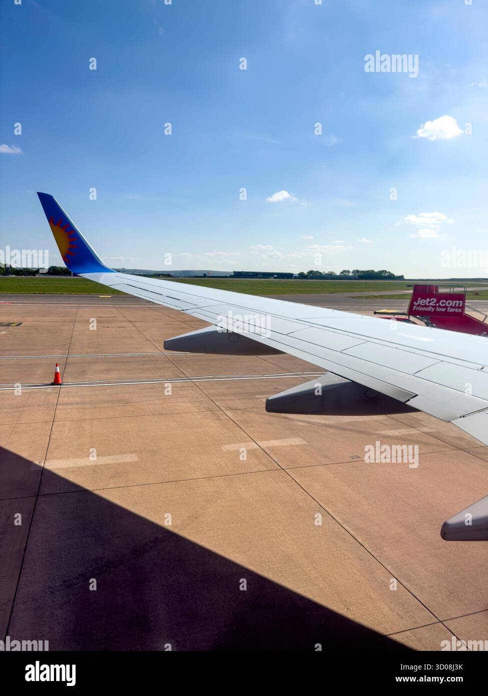 View through airplane window during departure from Bristol Airport aboard a Jet2holidays flight to Ibiza, 18 May 2025 - Smartphone Captured Stock Image