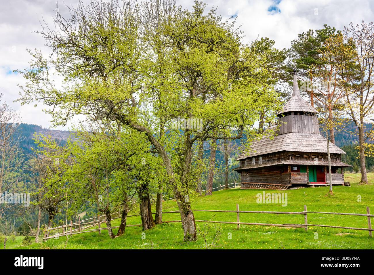 kuzhbeyi, ukraine - 12 may 2019: old wooden church on a hill in abandoned village of transcarpathia region, mizhhirya district. historic lemko archite Stock Photo