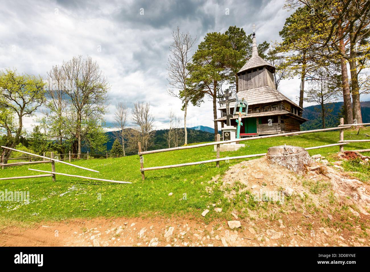 kuzhbeyi, ukraine - 12 may 2019: old wooden church on a hill in abandoned village of transcarpathia region, mizhhirya district. historic lemko archite Stock Photo