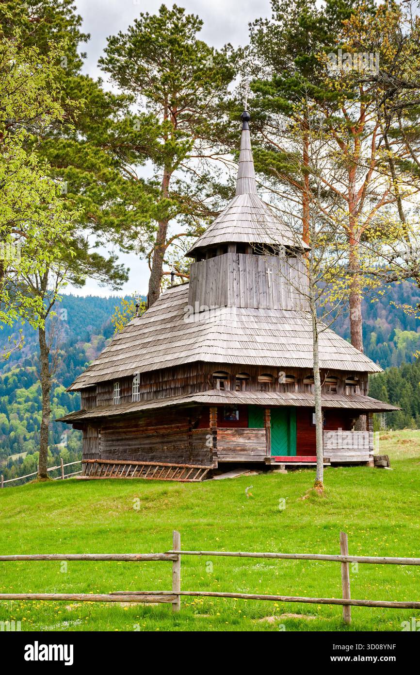 kuzhbeyi, ukraine - 12 may 2019: old wooden church on a hill in abandoned village of transcarpathia region, mizhhirya district. historic lemko archite Stock Photo