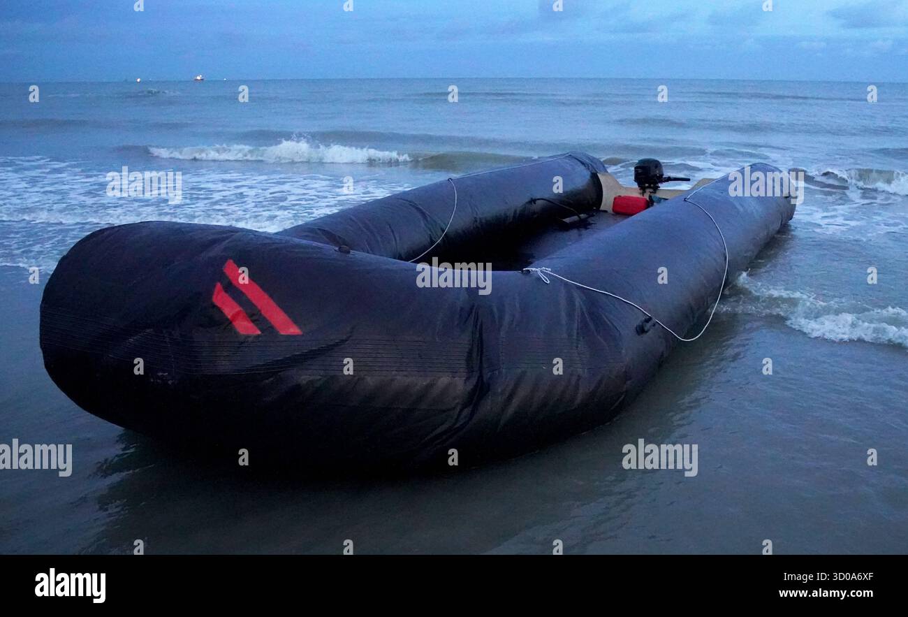 A deflating small boat discarded by people thought to be migrants on ...
