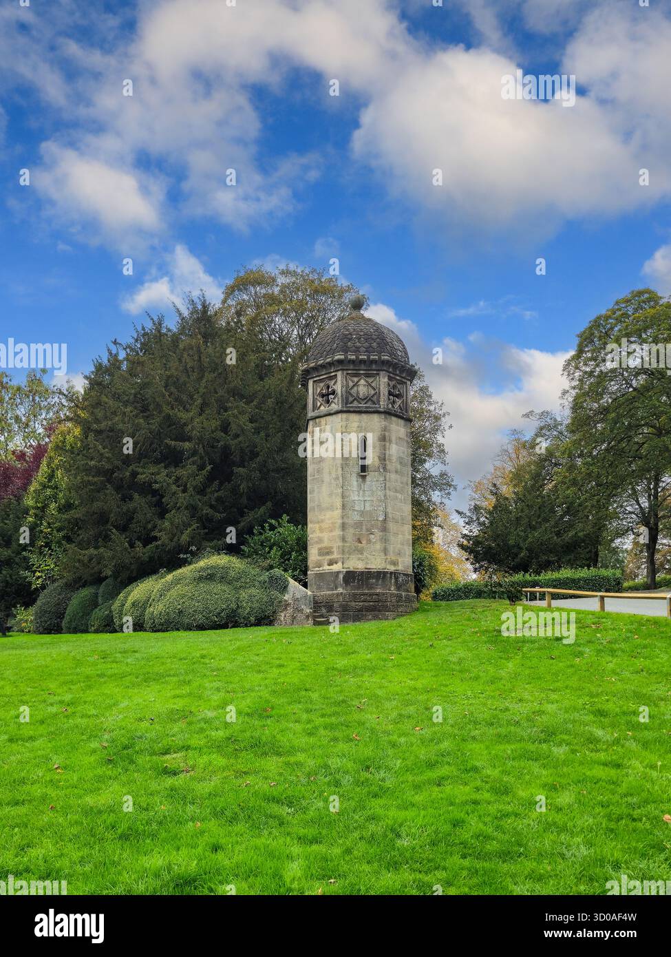'The Pepper Pot', a historical stone tower structure at Ilam Hall and gardens, Ilam, Staffordshire, England, UK - Smartphone Captured Stock Image