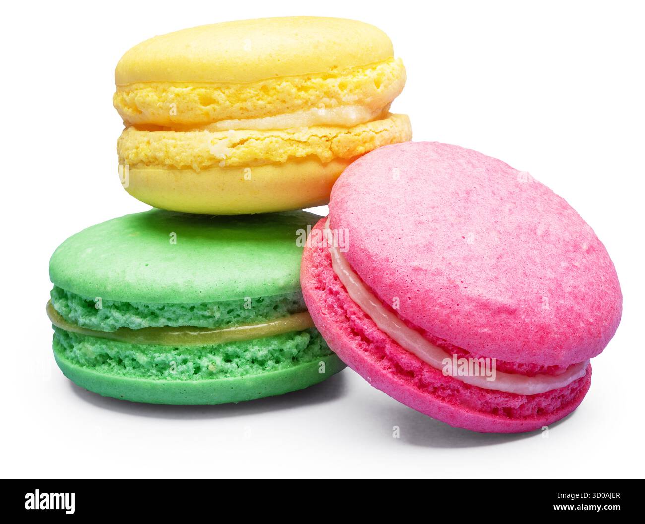 Three colorful macarons isolated on white background. File contains clipping paths. Stock Photo