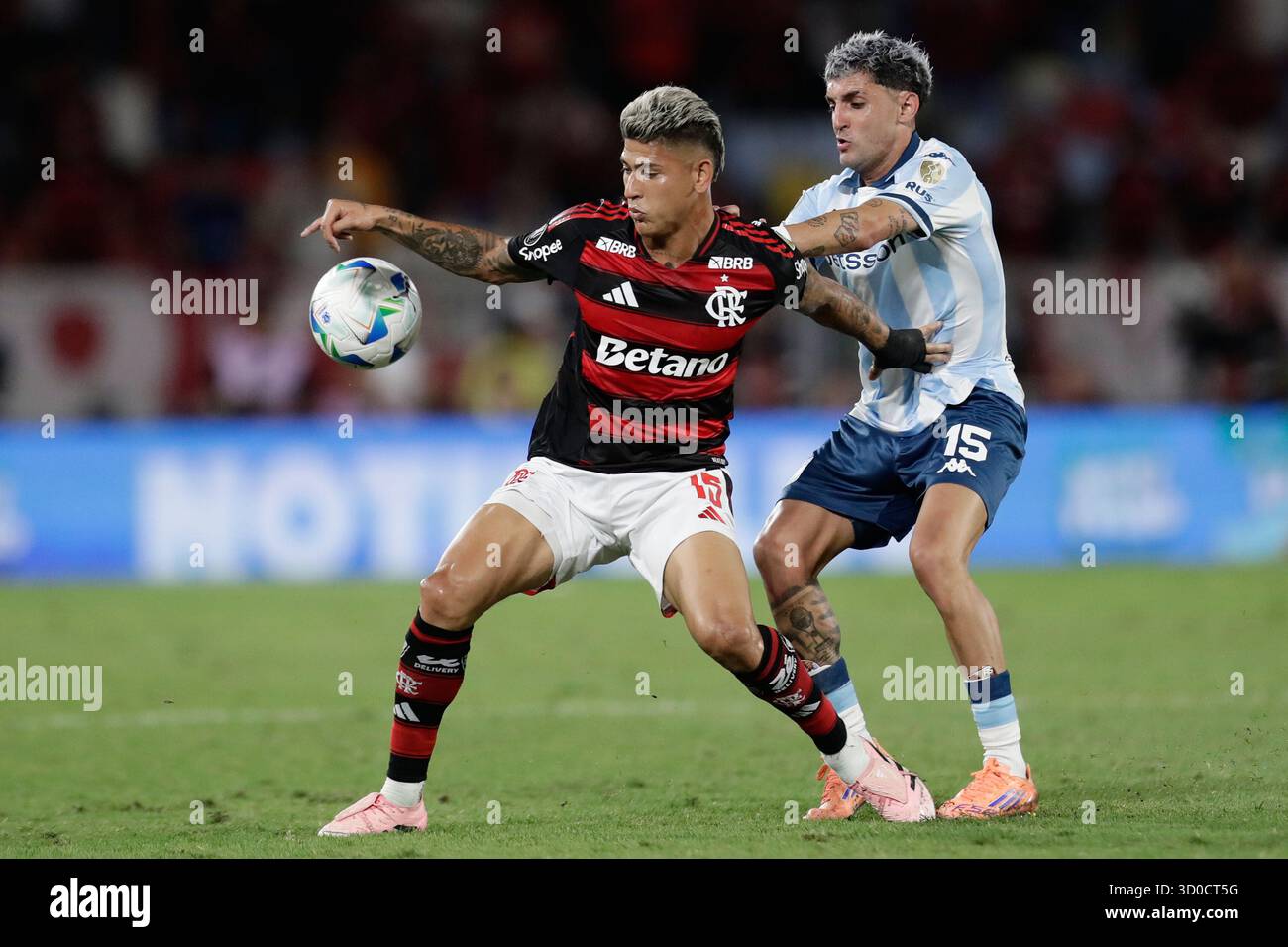 Jorge Carrascal of Brazil's Flamengo, left, is challenged by Gaston ...