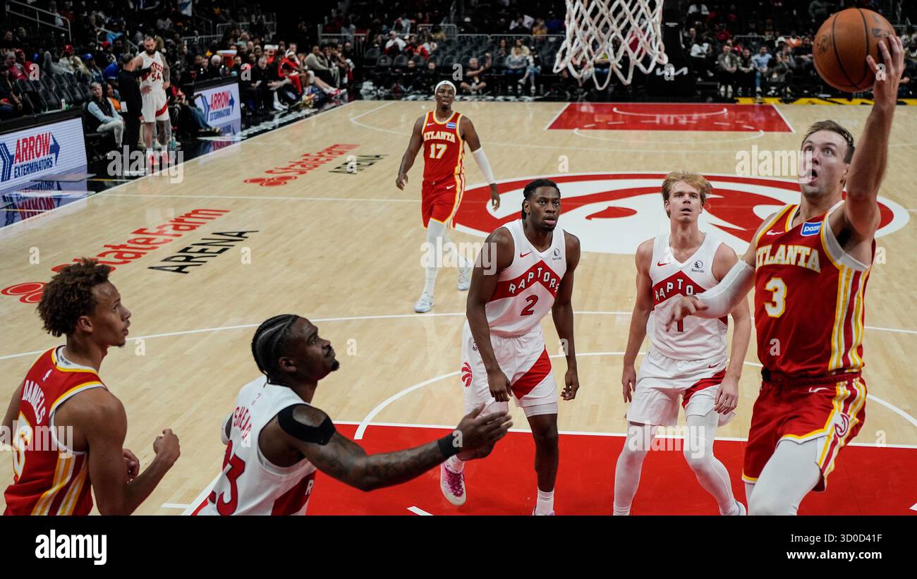 Luke Raptors Atlanta Hawks guard Luke Kennard (3) shoots against the Toronto Raptors ...