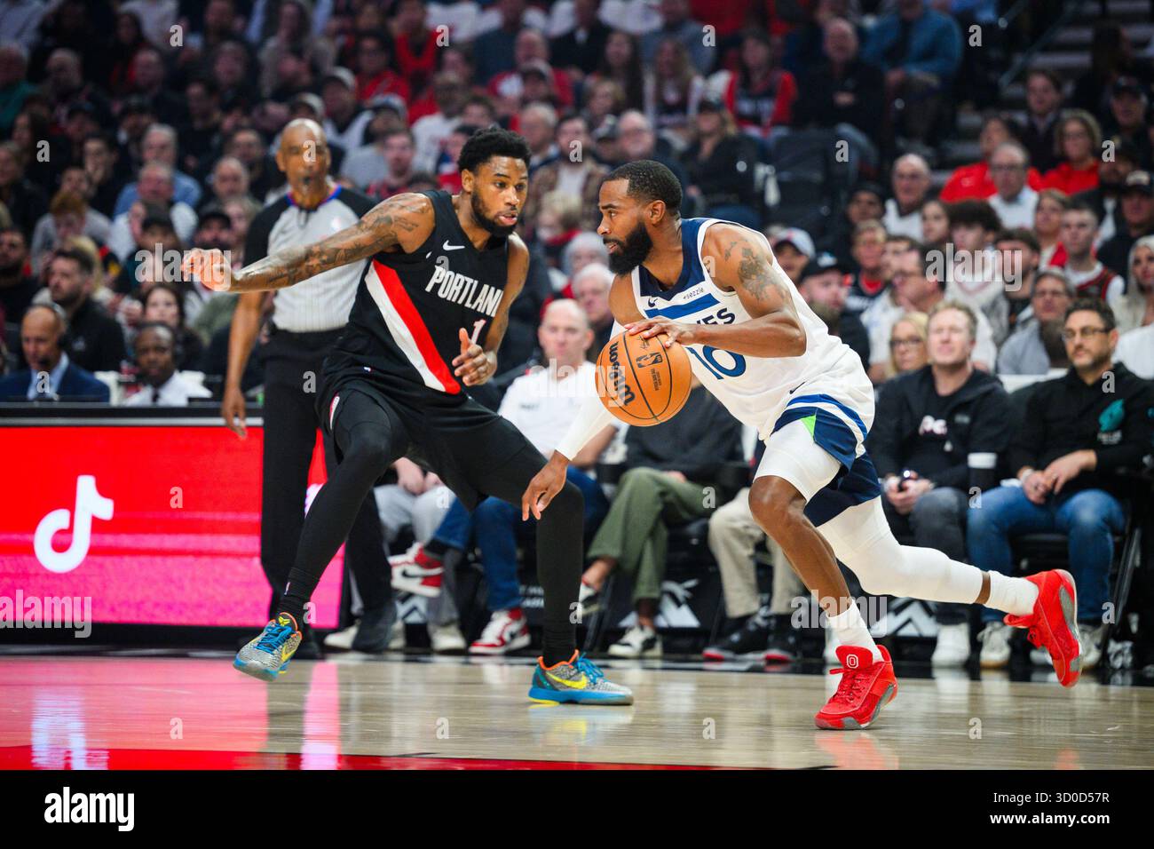 Minnesota Timberwolves guard Mike Conley (10) drives past Portland ...