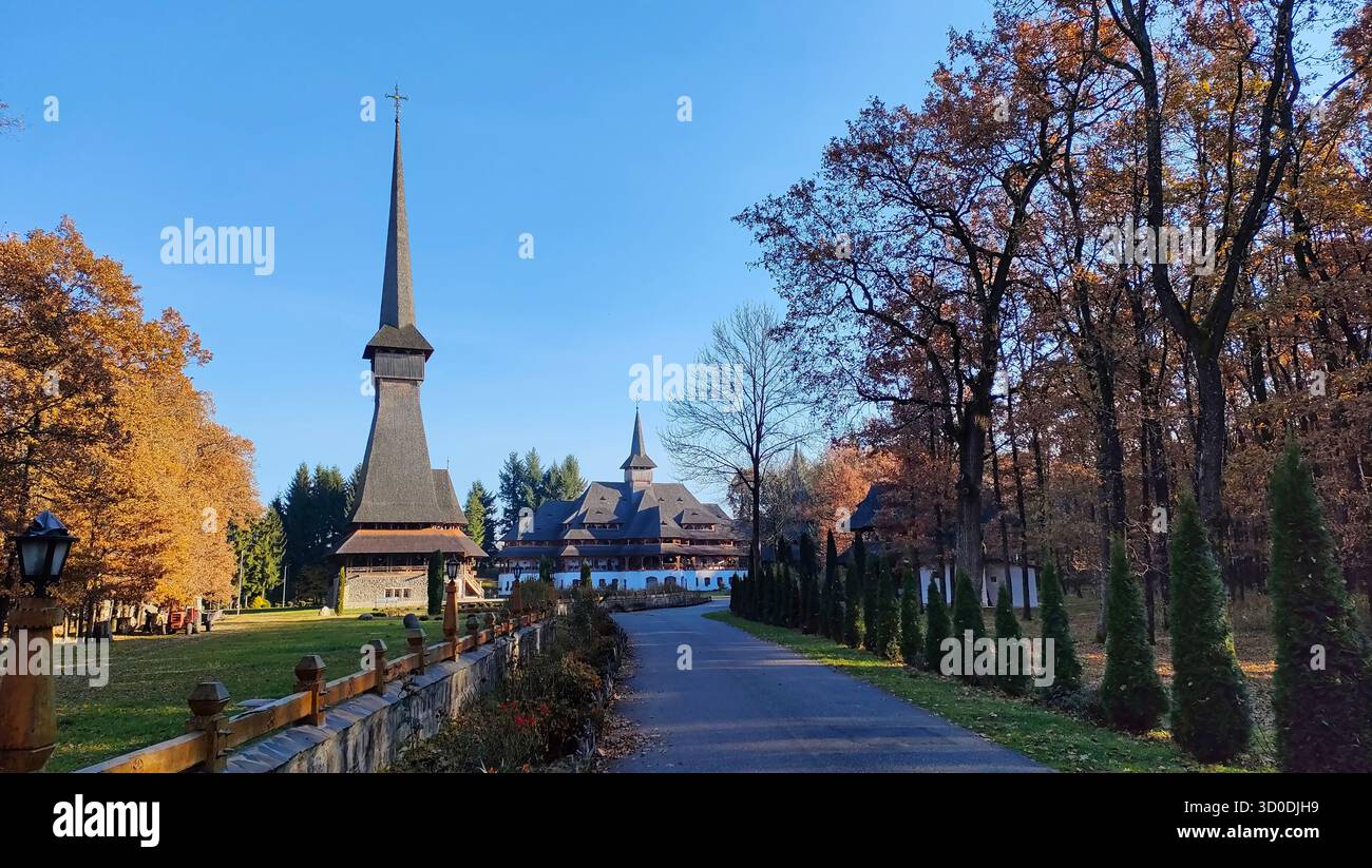 The wooden church of Sapanta Monastery, Maramures county, Romania (Biserica de lemn de la mănăstirea Săpânța Peri, Maramureş, România) - Smartphone Captured Stock Image