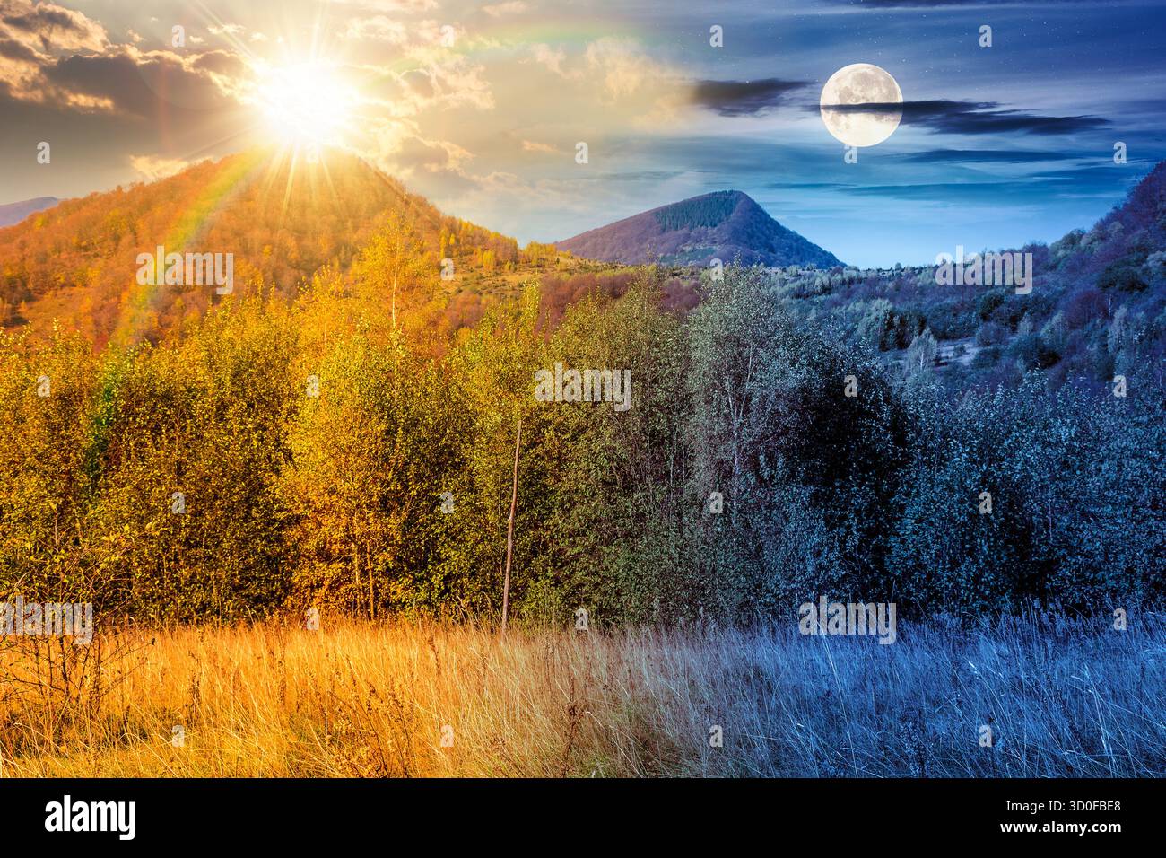 mountain landscape with forest on autumn equinox. day and night time change concept. nature park with birch trees in colorful foliage with sun and moo Stock Photo