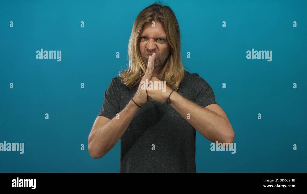 Blond man long hair presses hi-res stock photography and images - Alamy