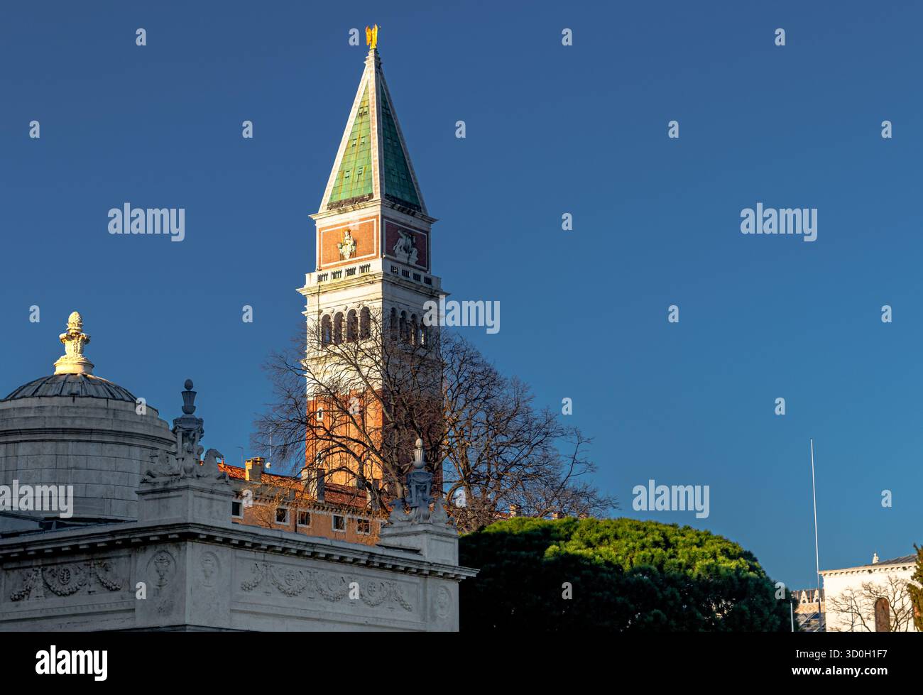 St Mark's Campanile or bell tower one of the most recognisable symbols of the city and the tallest structure in the city of Venice, Italy Stock Photo