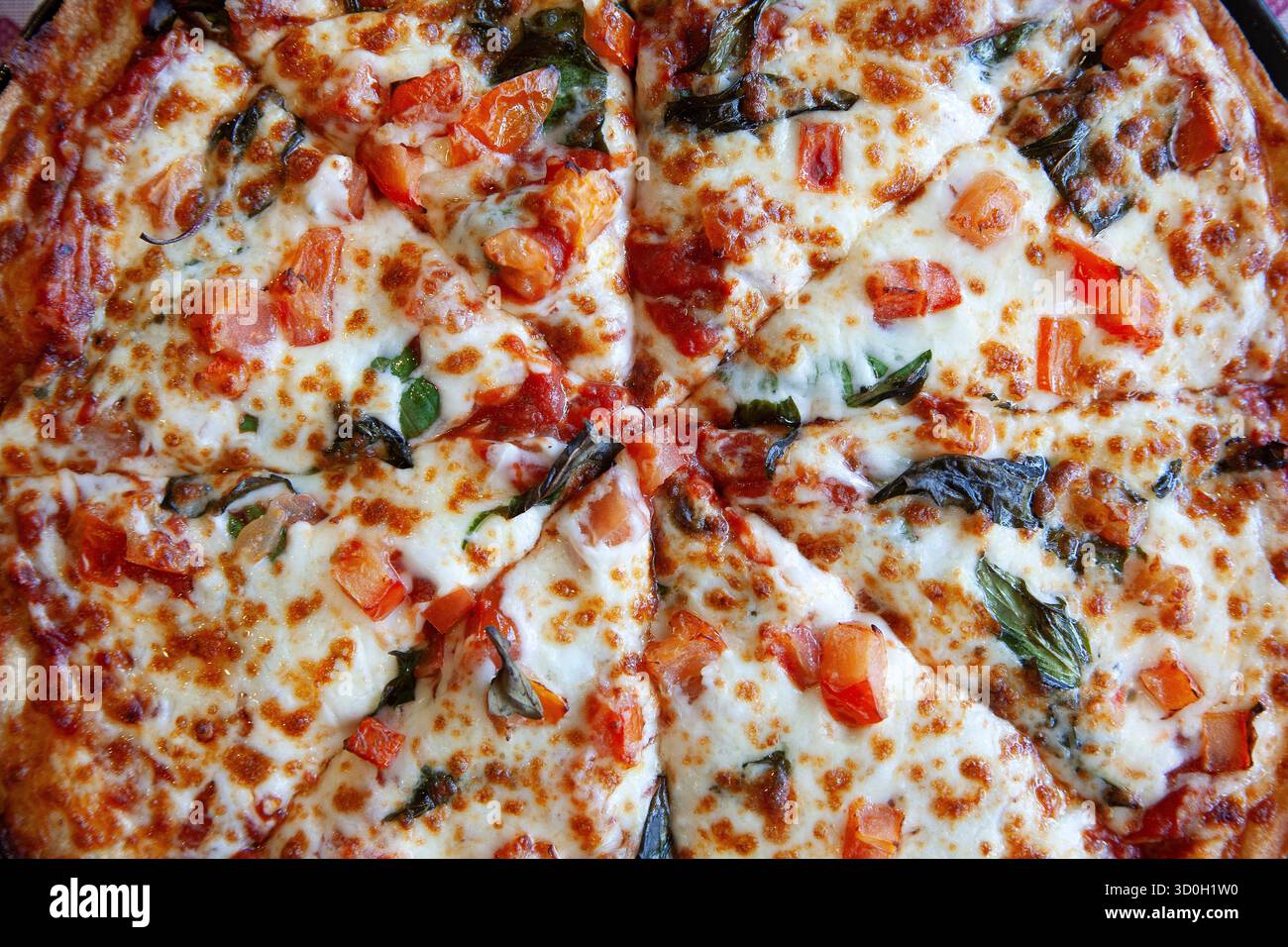 Pizza on a Table at a Restaurant Stock Photo