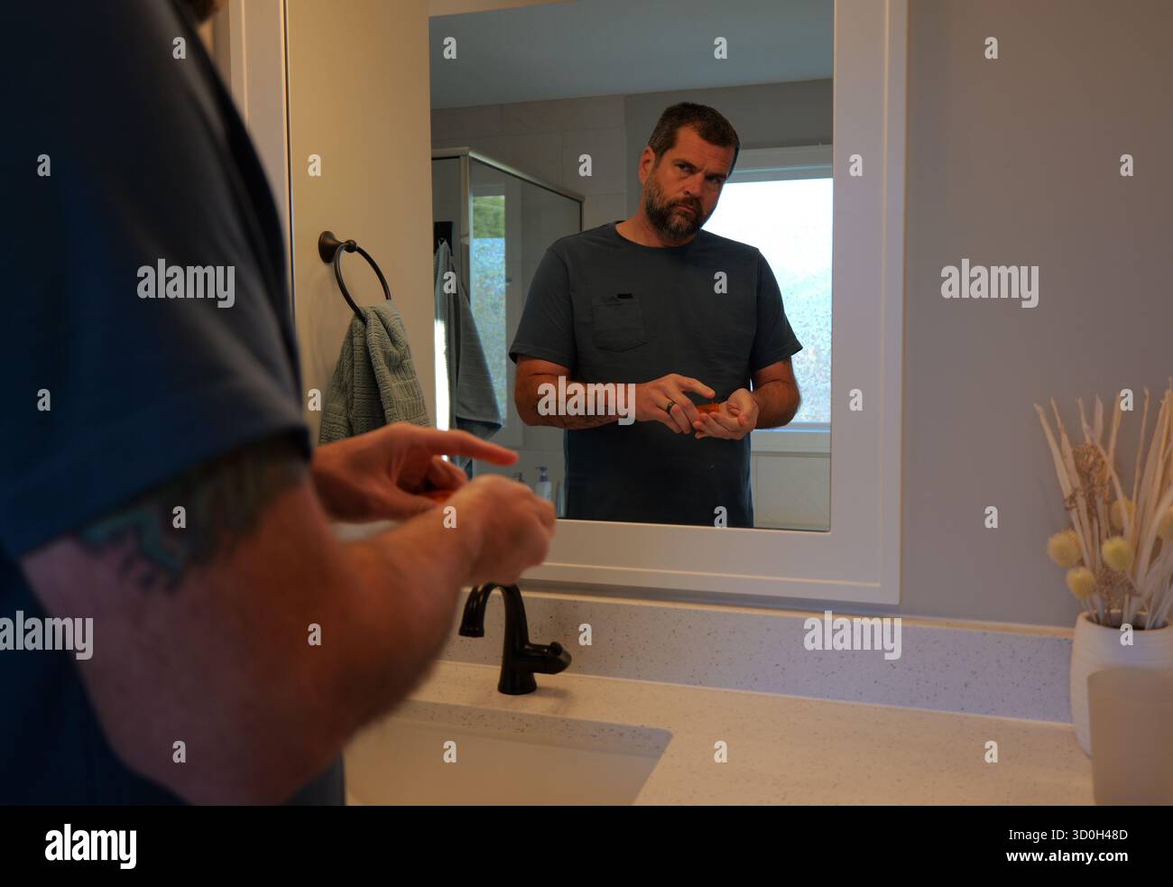 Middle-Aged Man Getting Ready Morning Routine Around His Home Stock ...