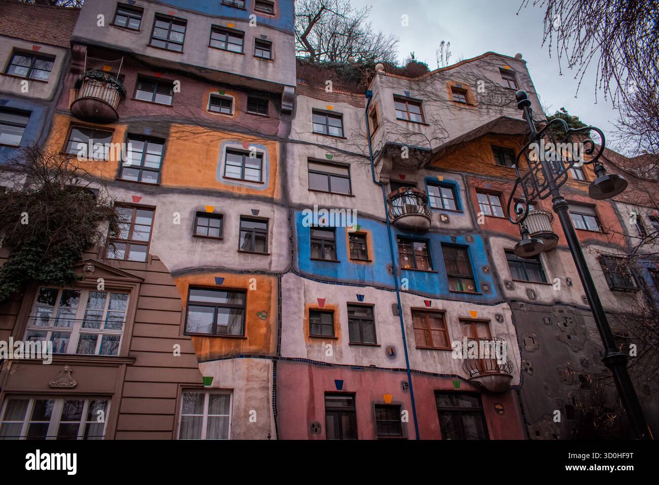 A colorful, architecturally unique building with vibrant geometric ...