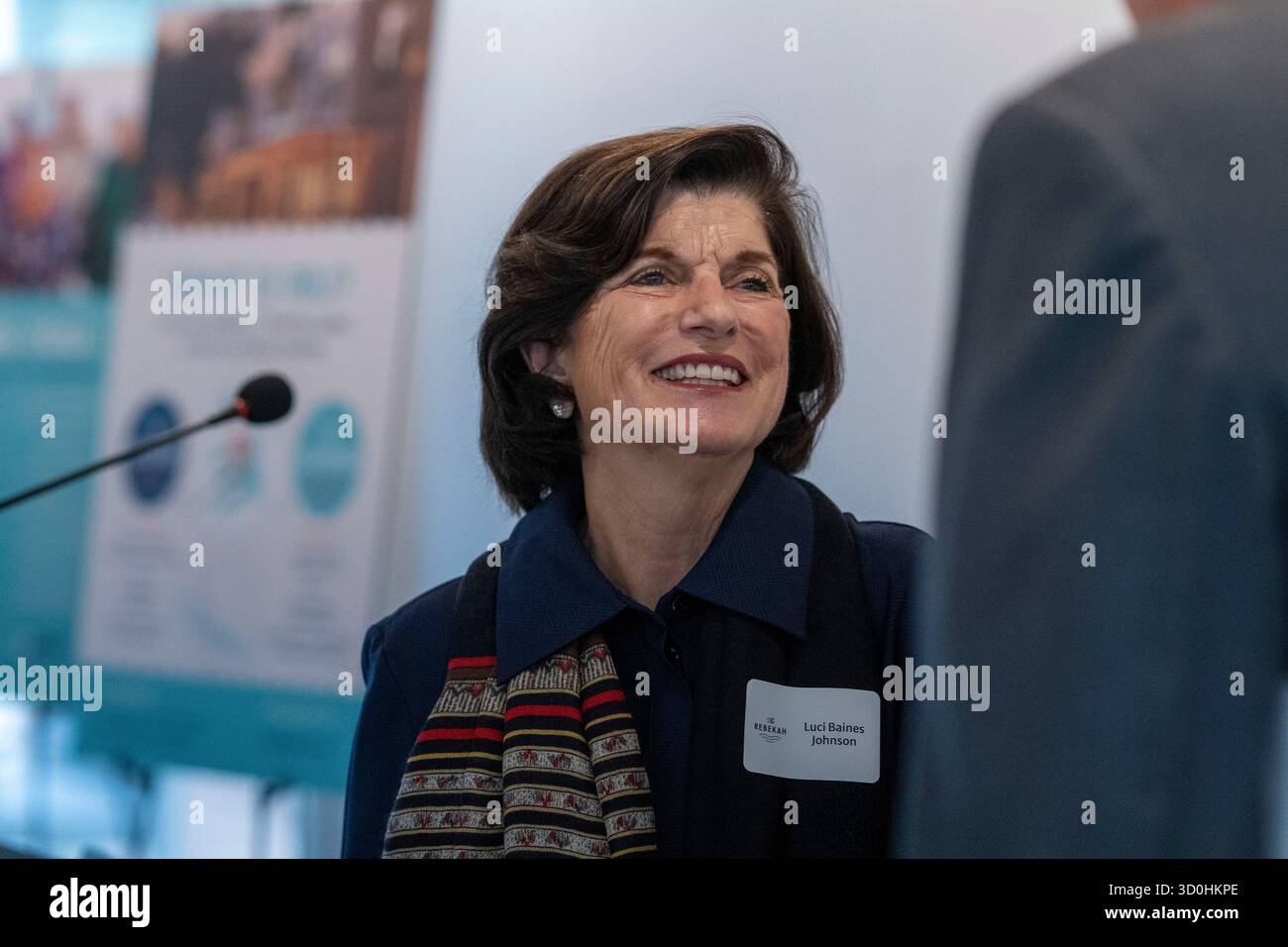 Austin Texas USA, October 22 2025: LUCI BAINES JOHNSON, daughter of President Lyndon Baines Johnson, speaks to a guest during the grand re-opening of the Rebekah Baines Johnson senior housing complex in east Austin. The 224-bed concrete structure, completed at the behest of President Johnson just before he left office in 1968, underwent a five-year major renovation by the Austin Housing Finance Corp. ©Bob Daemmrich Stock Photo