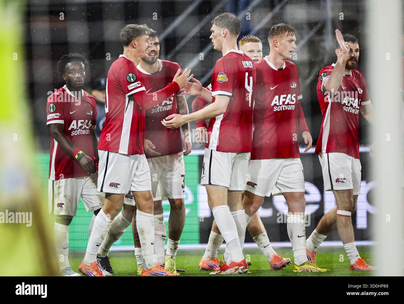 ALKMAAR - AZ Alkmaar players celebrate Sven Mijnans of AZ Alkmaar's 1-0 goal during the UEFA Conference League match between AZ Alkmaar and Slovan Bratislava at the AFAS Stadium on October 23, 2025, in Alkmaar, Netherlands. ANP BART STOUTJESDIJK Stock Photo
