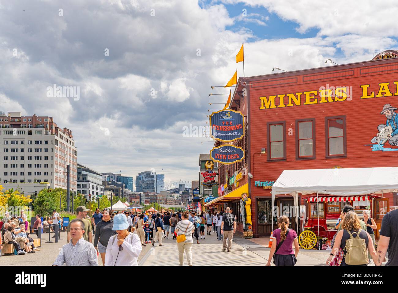 Seattle, WA, USA-August 17, 2025: Seattle's vibrant newly renovated waterfront district. Stock Photo
