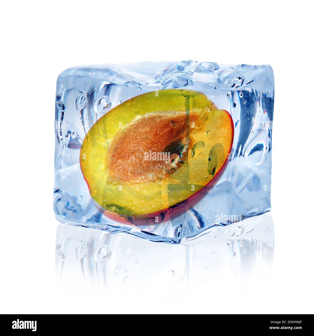 Half of plum inside ice cube isolated on white Stock Photo