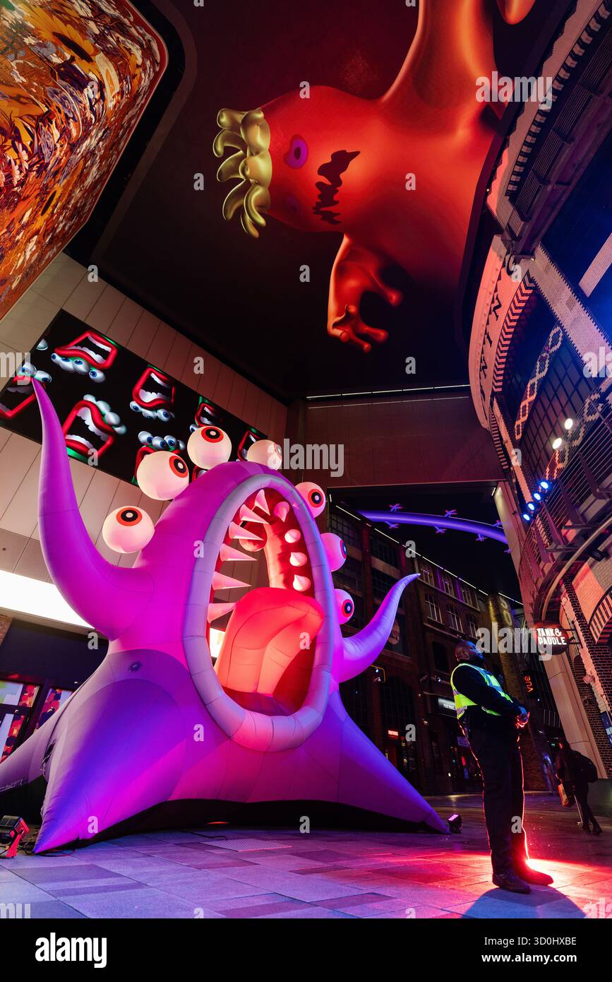 Security Guard Monster EDITORIAL USE ONLY A security guard watches over the R.STINKWORP ...