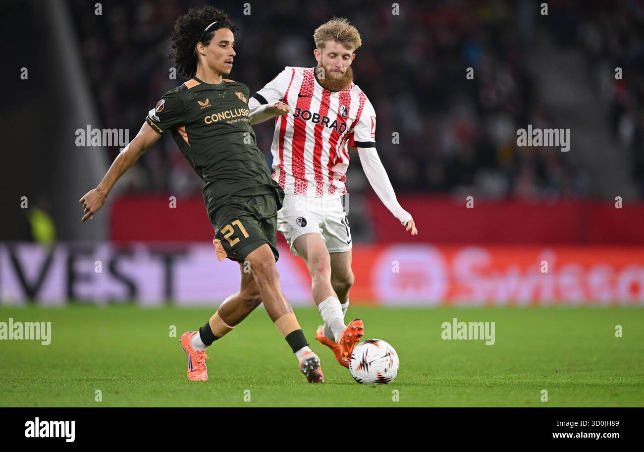 Utrecht's Gjivai Zechiel, left, and Freiburg's Jan-Niklas Beste in ...